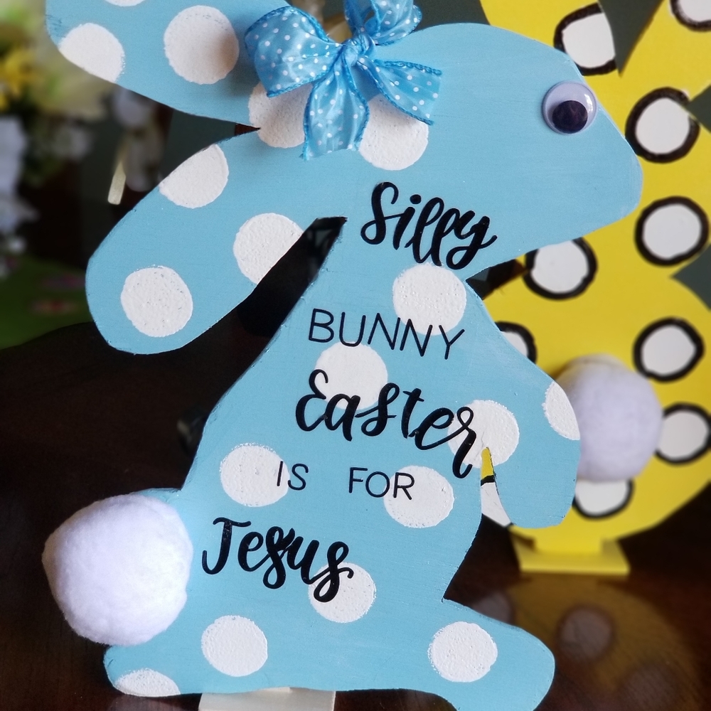 Painted wood Bunny on stand.